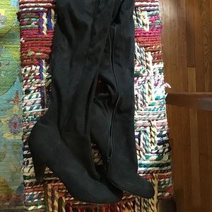 Thigh high black boots